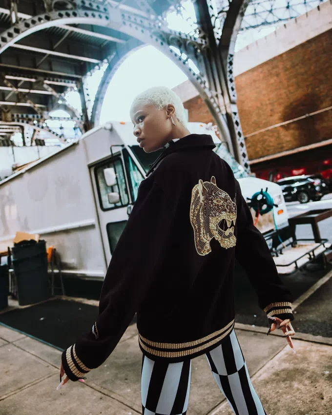 A.I.9 AFRICAN INTELLIGENCE GUILDED LEOPARD - CHAQUETA VARSITY EN COLABORACIÓN CON SANDFLOWER