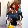 BOLSA DE VIAJE MINI «LEVELED UP SPLIT QUILT SHARK»