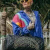 BOLSO DE VIAJE NOIR QUILT CON CADENA DORADA Y DETALLE DE TIBURÓN