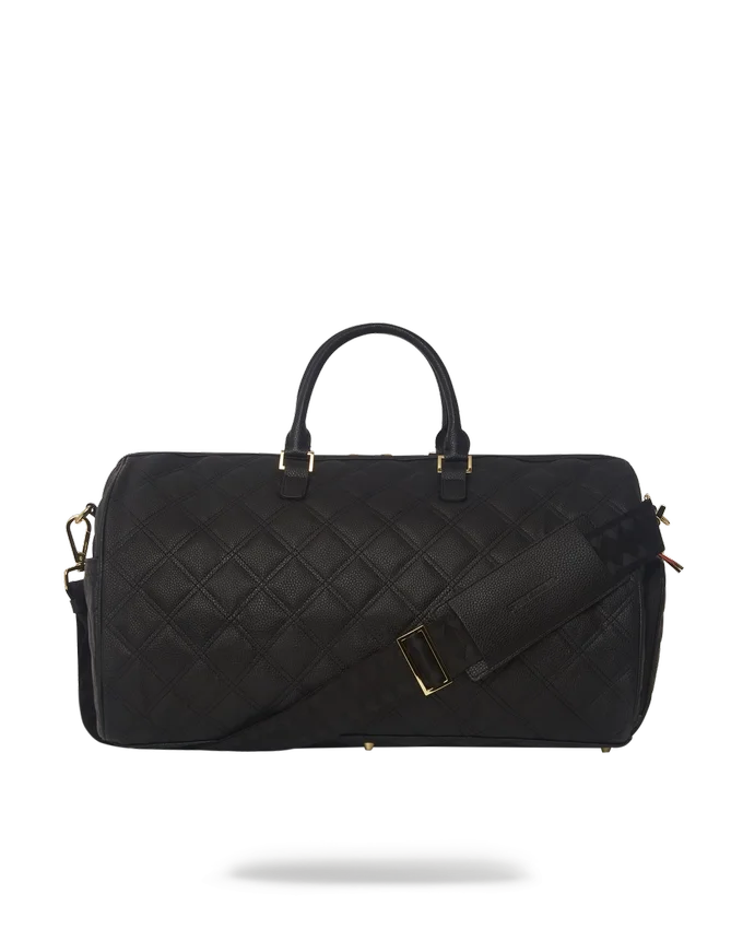BOLSO DE VIAJE NOIR QUILT CON CADENA DORADA Y DETALLE DE TIBURÓN