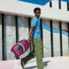 Mochila con colaboración de «SQUID GAME»: Frente con hombre y espalda con tiburones rosas