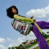 Mochila con correa para skate «CREATE ANOTHER DAY»