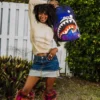 Mochila DLXR «Nibbler Eats Shark» de Futurama