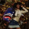 Mochila DLXR «Nibbler Eats Shark» de Futurama