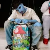 Mochila «LOS PITUFOS EN EL JARDÍN»