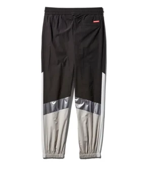 PANTALONES CORTAVIENTO CON BLOQUES DE COLOR